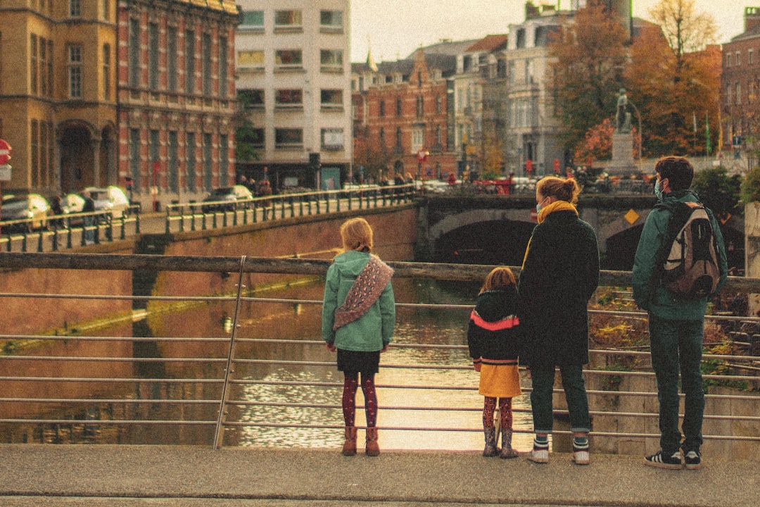 Family overlooking a city during a sightseeing trip