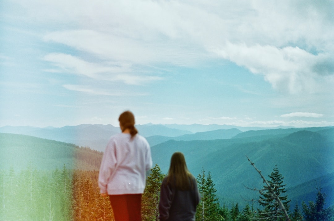 Family travelers enjoying a scenic mountain viewpoint