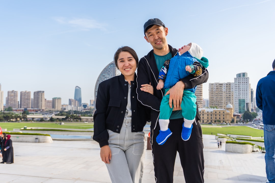 A family traveling together in a city